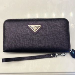 Designer inspired genuine leather wristlet. New